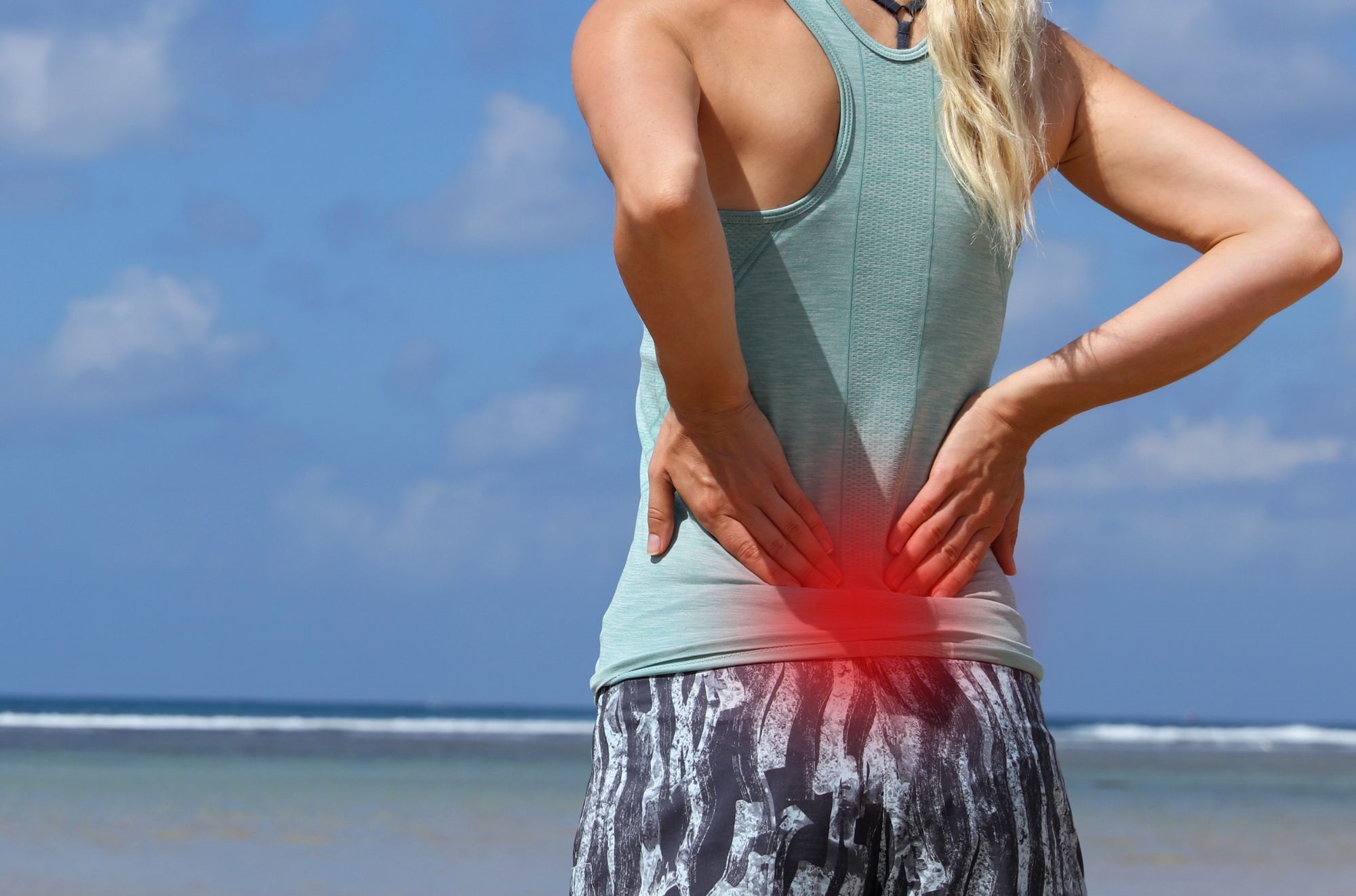 A Woman With Back Pain From Running